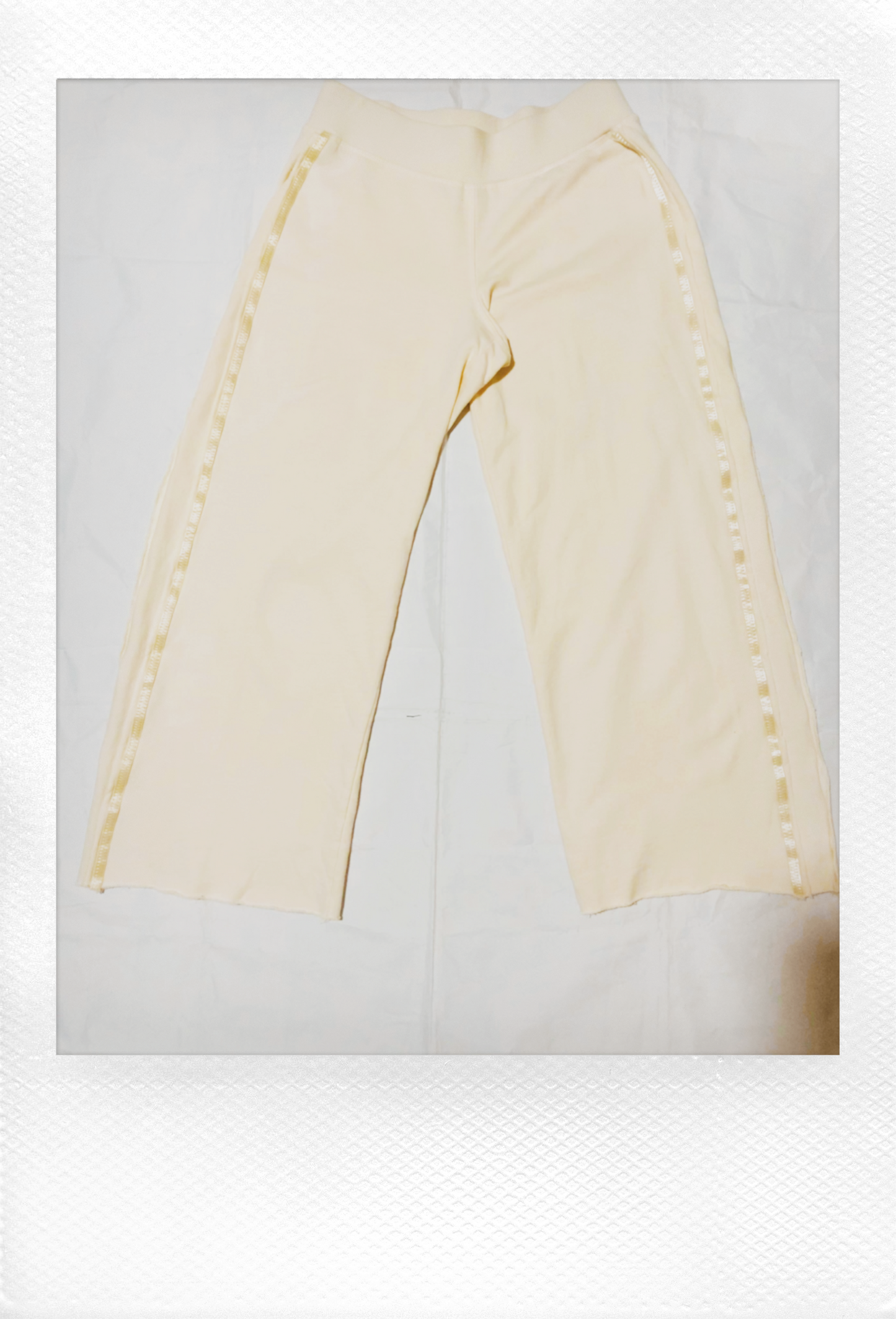 BEBE LOWRISE CAPRI CREAM STRIPE PANTS